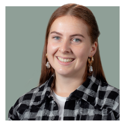 Headshot of Max Winders, author of The Adventures of Mooka & Lou. Max is smiling warmly, wearing a casual flannel button-up shirt. The image is clipped with no background.